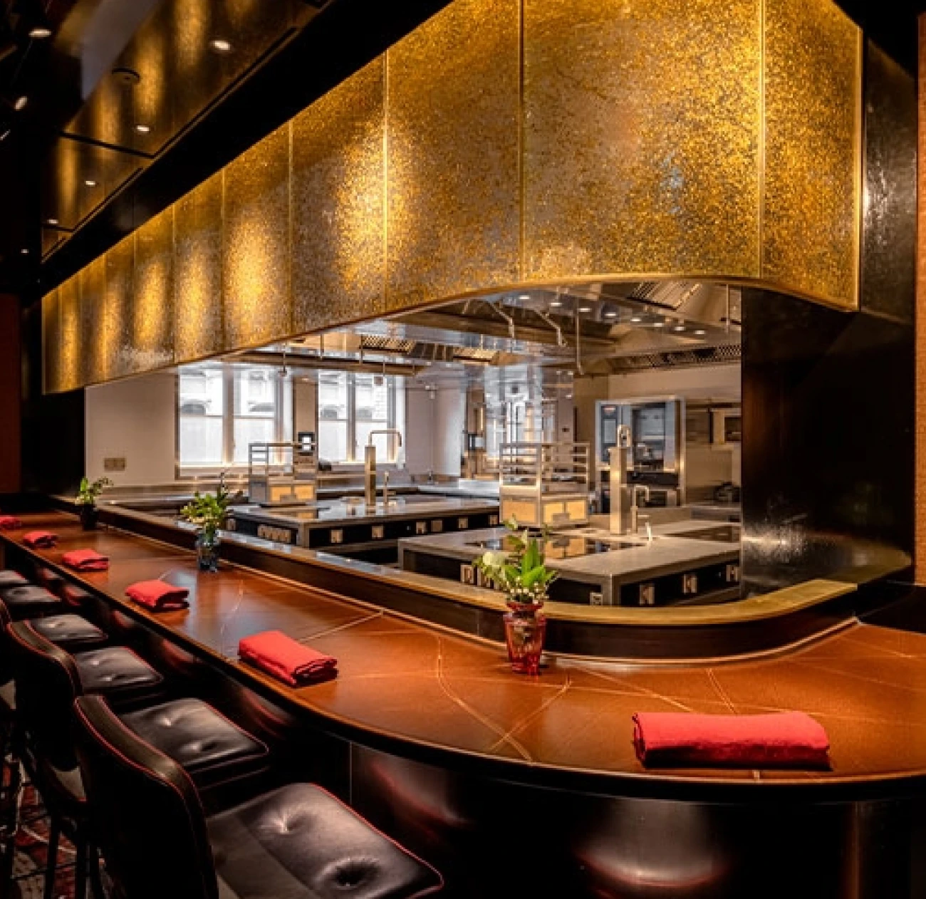 the rustic bar top at The Cocochine in mayfair, one of the most anticipated restaurant openings of 2024Tim Jefferies and Chef Larry Jayasekara introduce The Cocochine in Bruton Place, Mayfair. This intimate restaurant focuses on personal connection and old-school hospitality, with no online bookings. The Cocochine features a 28-seat dining room and a mosaic-covered chef's counter, creating a space that celebrates art and craftsmanship.