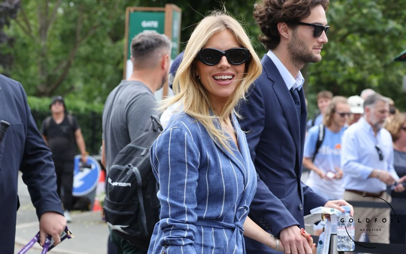 Sienna Miller Walking into the Wimbledon Tennis Championship in 2023 in a stunning striped suit paired with chunky black heels Sienna Miller Walking into the Wimbledon Tennis Championship in 2023 in a stunning striped suit paired with chunky black heels