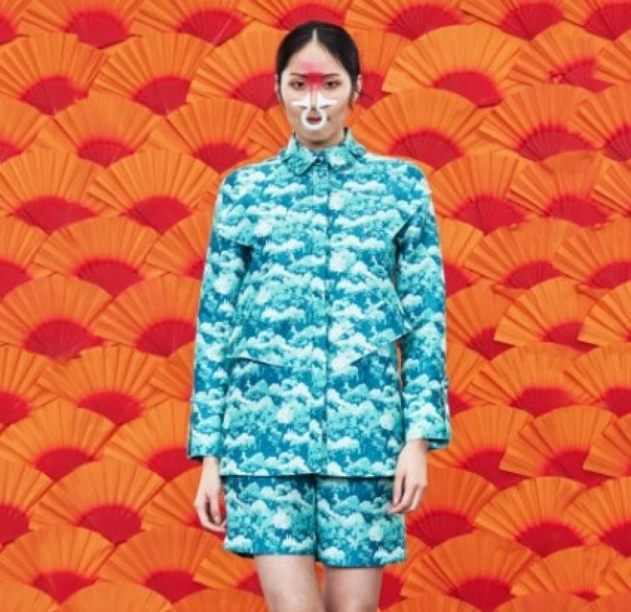 APUJAN is a Taiwanese fashion brand known for its unique blend of traditional Asian influences and contemporary design. The brand often features intricate prints, innovative knitwear, and a strong narrative element in its collections.