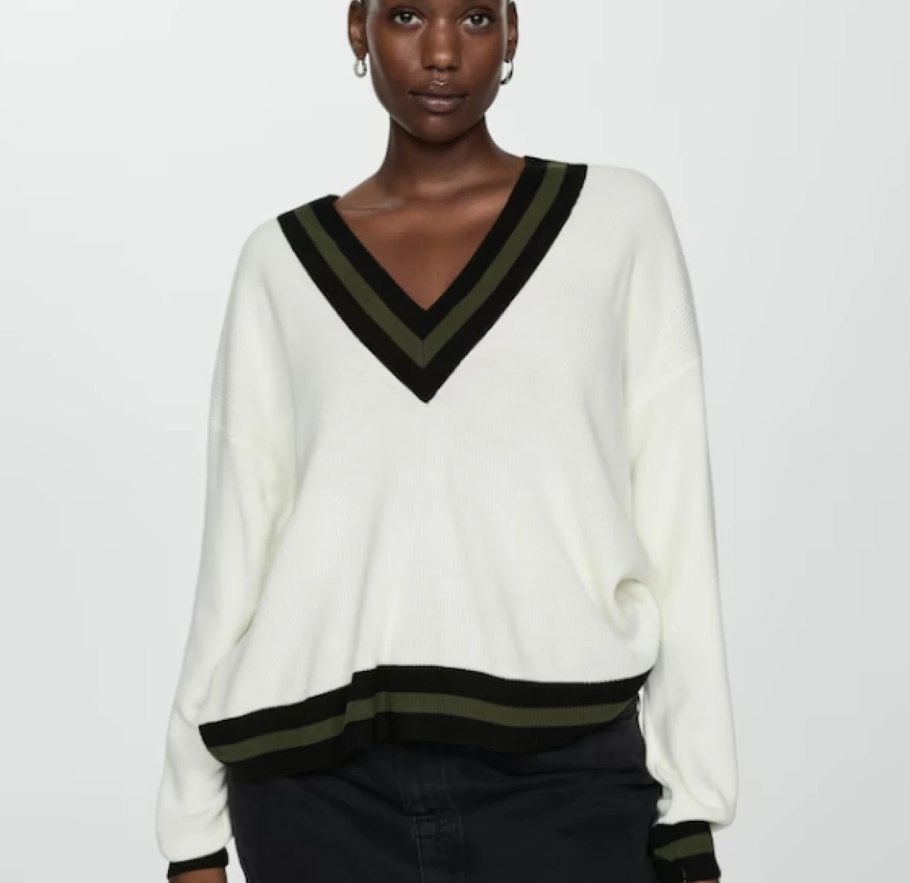 contrasting knitted vest from Mango is currently at 50% off and is one of our top fashion picks for the autumn season