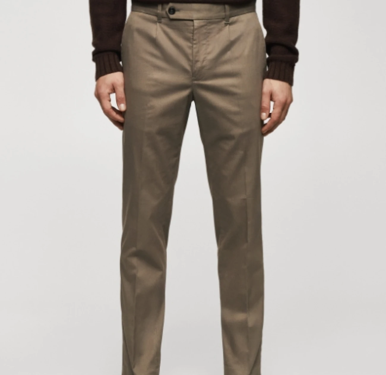 light trousers with asymmetric button and a small pleating is currently on sale from Mango - goldfoil magazine is your go to source for fashion and lifestyle news
