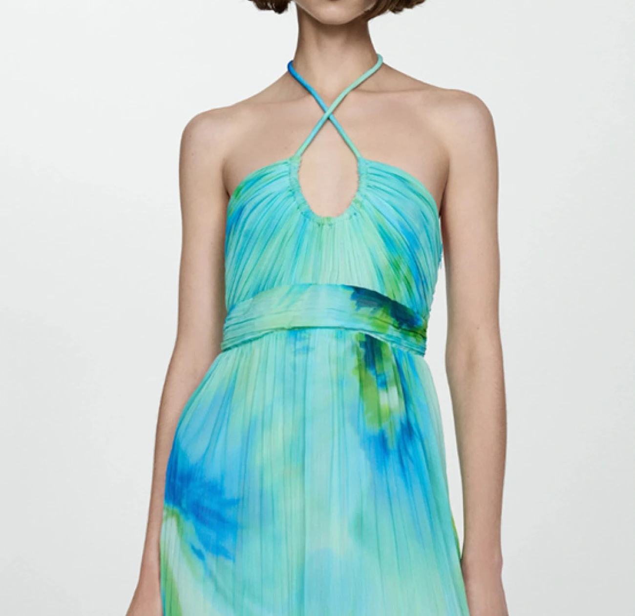 long summer strap dress with a low neck sleeveless silhouette in marine prints is currently on sale from the Mango store