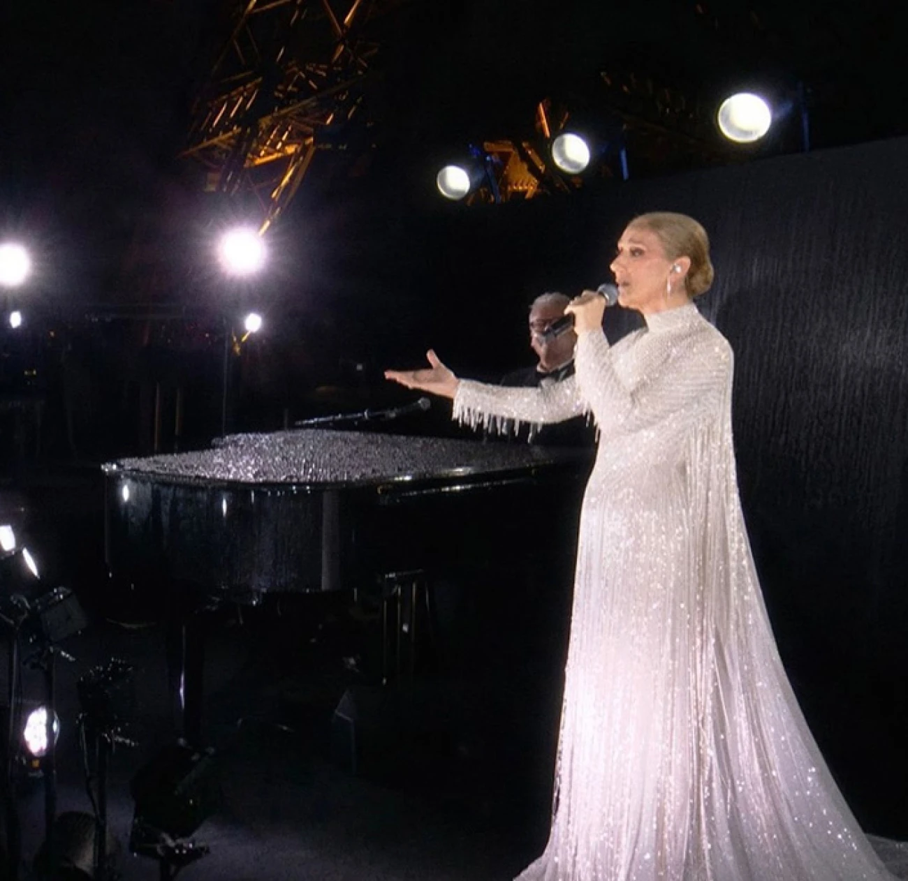 First, we must highlight what is probably the best work from Maria Grazia Chiuri we have seen at Dior - the gown that Celine Dion wore for the opening ceremony. This stunning white embellished gown, adorned with tassels and crystals, resembles a masterpiece frozen in time, bringing an ethereal aesthetic to Dion. It is a truly masterful creation that is destined to end up in a museum.