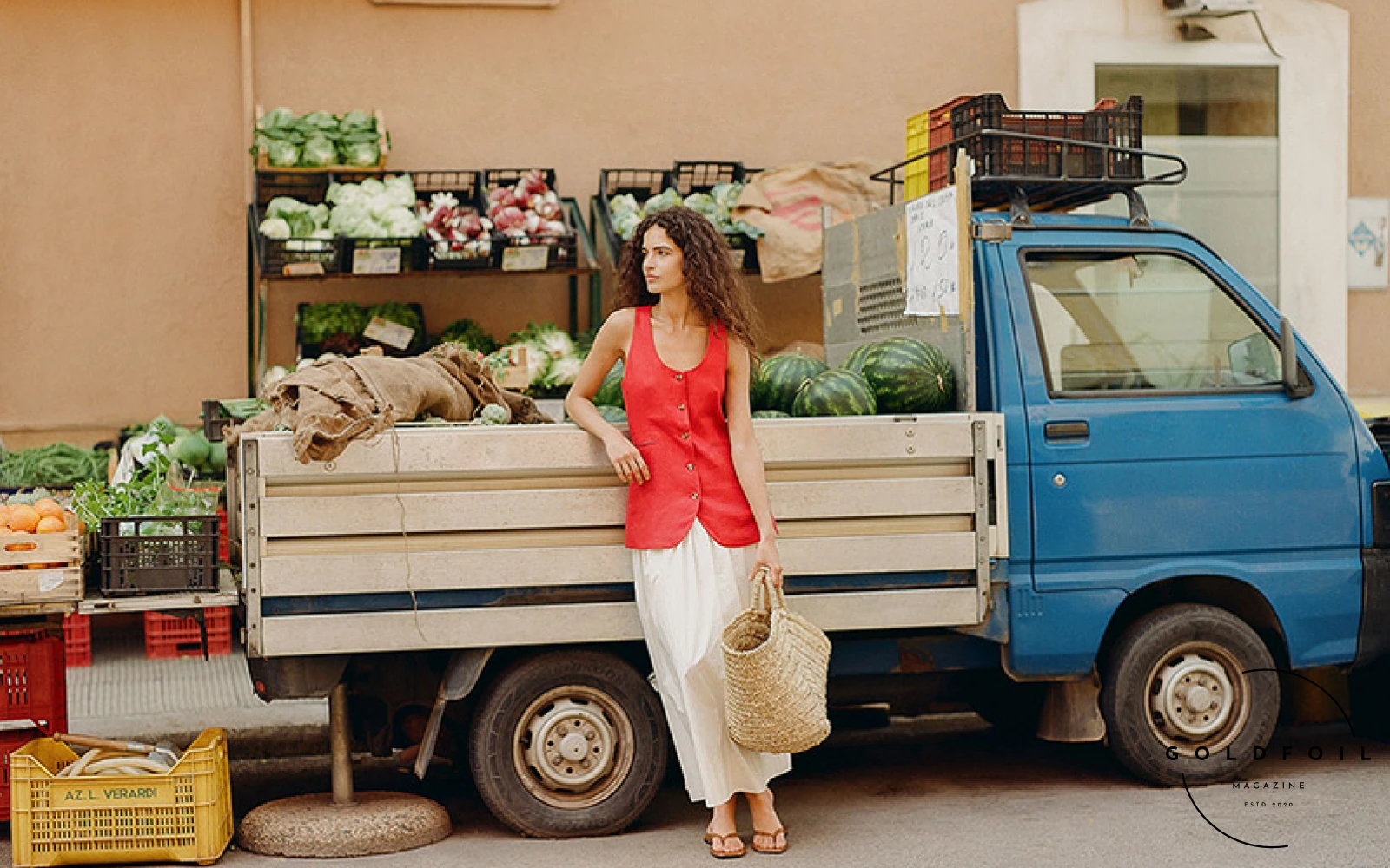 Posse launches a fantastic pop up in selfridges, london celebrating quiet luxury linen clothing, in the photo we see a model wearing a button up red linen top and a natural linen skirt, with a woven bag Posse launches a fantastic pop up in selfridges, london celebrating quiet luxury linen clothing, in the photo we see a model wearing a button up red linen top and a natural linen skirt, with a woven bag