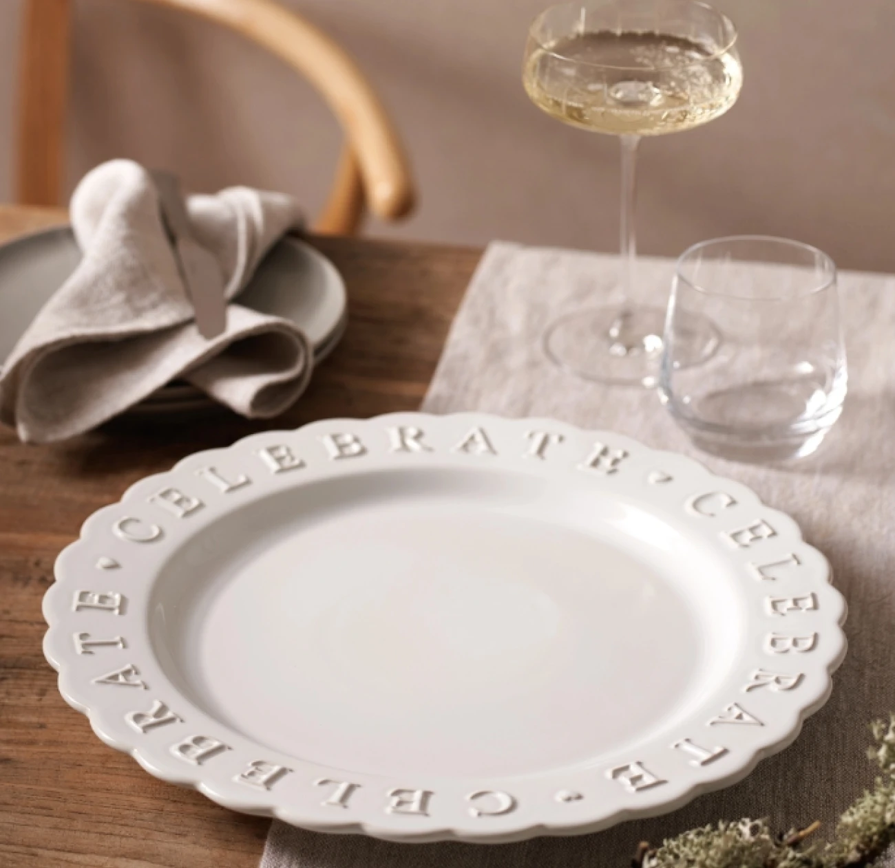The white company embossed white dining plate is perfect for your christmas dinner table
