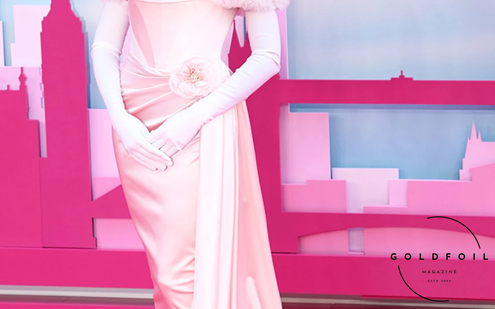 Margot Robbie at the Barbie premiere in London wearing a custom silk pink gown Margot Robbie at the Barbie premiere in London wearing a custom silk pink gown