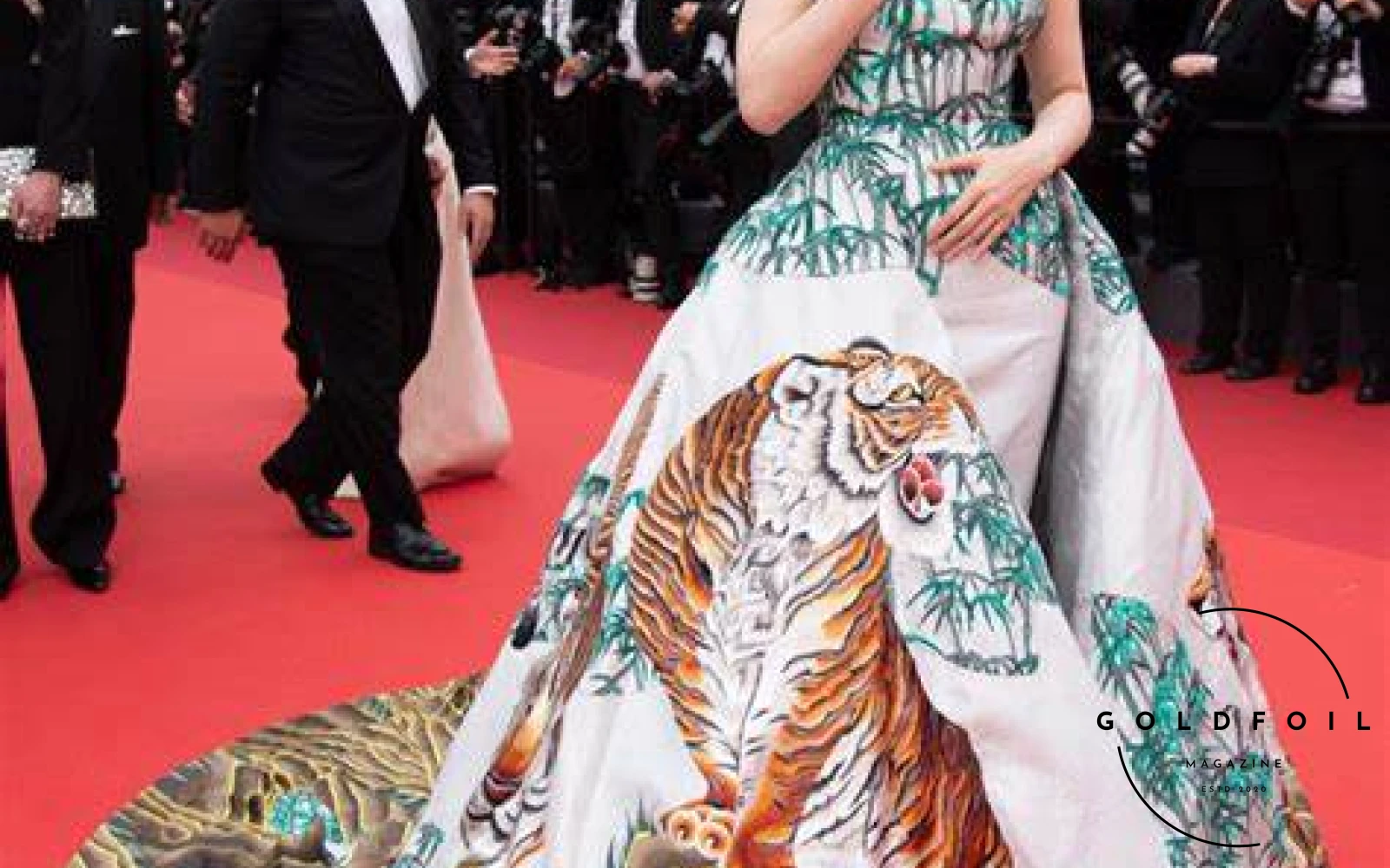 Fan Bingbing wearing Christopher Bu gown to the Cannes festival stealing the show in a stunning dress with tigers and bamboo prints Fan Bingbing wearing Christopher Bu gown to the Cannes festival stealing the show in a stunning dress with tigers and bamboo prints