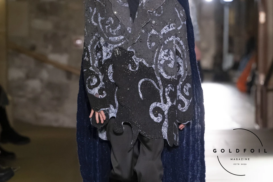 Mithridate showcased their London Fashion Week AW24 collection, this outfit features an asymmetric blazer cut in a floral pattern embellished beautifully with crystals which reflect all the light within the space Mithridate showcased their London Fashion Week AW24 collection, this outfit features an asymmetric blazer cut in a floral pattern embellished beautifully with crystals which reflect all the light within the space