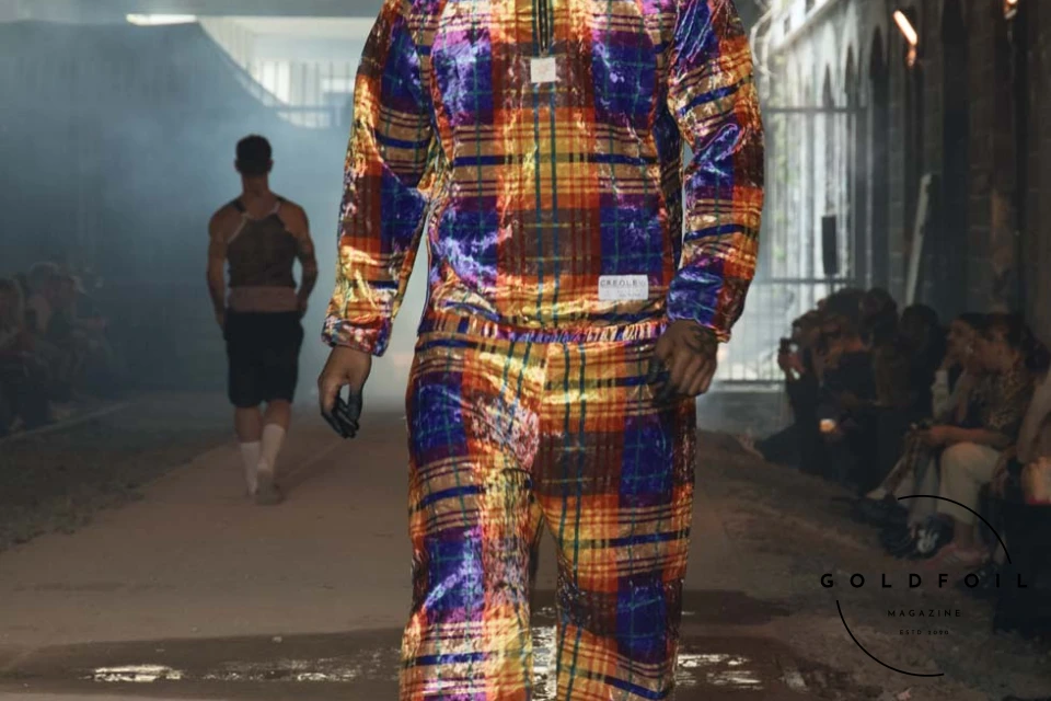 C.R.E.O.L.E is a manifesto exploring the heritage and future potential of the Creole community and diaspora. The brand challenges traditional gender norms by reimagining the typical men's wardrobe with unisex codes, delicate techniques, and workwear silhouettes. It aims to express Creole culture beyond the usual associations with tourism, music, or entertainment, offering a perspective shaped by historical, social, and political contexts. C.R.E.O.L.E seeks to de-exoticize the narrative around Creole identity, presenting it with a delicate queer sensibility. This expression of identities aims to welcome the world with new perspectives and consciousness. C.R.E.O.L.E is a manifesto exploring the heritage and future potential of the Creole community and diaspora. The brand challenges traditional gender norms by reimagining the typical men's wardrobe with unisex codes, delicate techniques, and workwear silhouettes. It aims to express Creole culture beyond the usual associations with tourism, music, or entertainment, offering a perspective shaped by historical, social, and political contexts. C.R.E.O.L.E seeks to de-exoticize the narrative around Creole identity, presenting it with a delicate queer sensibility. This expression of identities aims to welcome the world with new perspectives and consciousness.