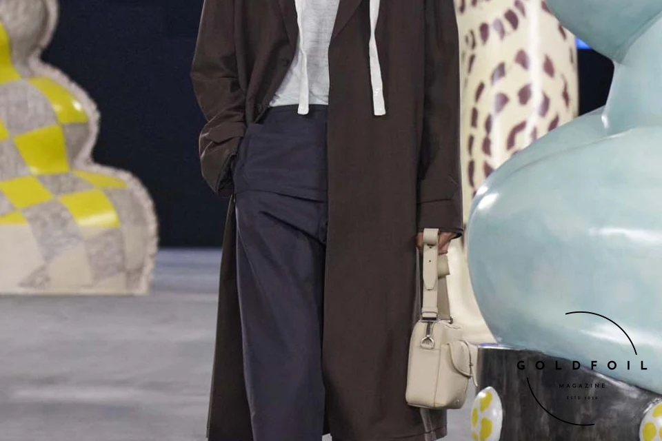 Runway show of Dior Summer 2025 Collection featuring sculptural silhouettes inspired by ceramic forms and atelier craftsmanship, designed by Kim Jones. Runway show of Dior Summer 2025 Collection featuring sculptural silhouettes inspired by ceramic forms and atelier craftsmanship, designed by Kim Jones.