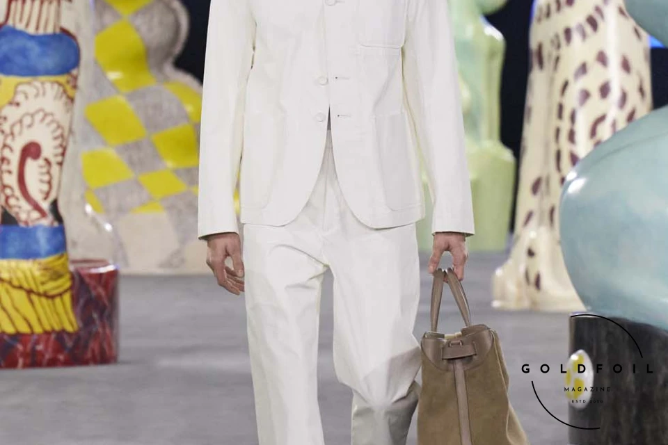 Runway show of Dior Summer 2025 Collection featuring sculptural silhouettes inspired by ceramic forms and atelier craftsmanship, designed by Kim Jones. Runway show of Dior Summer 2025 Collection featuring sculptural silhouettes inspired by ceramic forms and atelier craftsmanship, designed by Kim Jones.