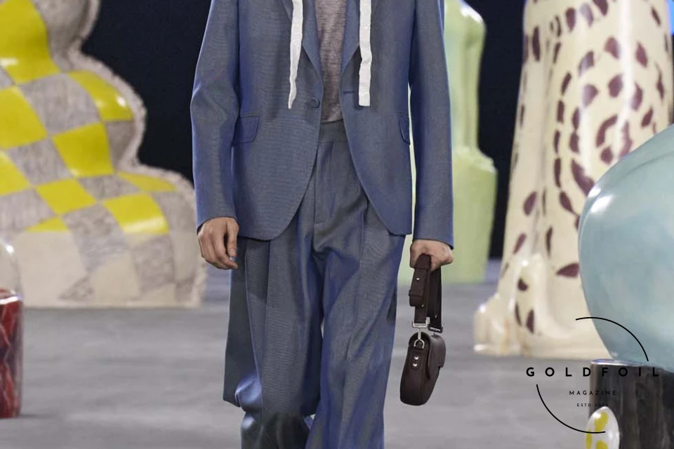 Runway show of Dior Summer 2025 Collection featuring sculptural silhouettes inspired by ceramic forms and atelier craftsmanship, designed by Kim Jones. Runway show of Dior Summer 2025 Collection featuring sculptural silhouettes inspired by ceramic forms and atelier craftsmanship, designed by Kim Jones.