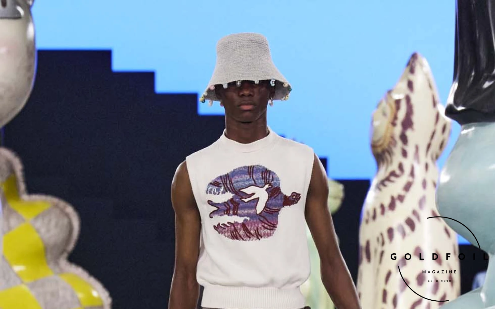 Runway show of Dior Summer 2025 Collection featuring sculptural silhouettes inspired by ceramic forms and atelier craftsmanship, designed by Kim Jones. Runway show of Dior Summer 2025 Collection featuring sculptural silhouettes inspired by ceramic forms and atelier craftsmanship, designed by Kim Jones.