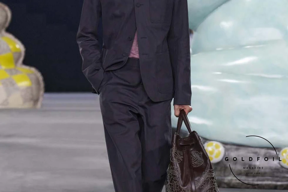 Runway show of Dior Summer 2025 Collection featuring sculptural silhouettes inspired by ceramic forms and atelier craftsmanship, designed by Kim Jones. Runway show of Dior Summer 2025 Collection featuring sculptural silhouettes inspired by ceramic forms and atelier craftsmanship, designed by Kim Jones.