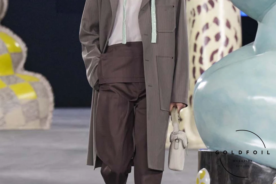 Runway show of Dior Summer 2025 Collection featuring sculptural silhouettes inspired by ceramic forms and atelier craftsmanship, designed by Kim Jones. Runway show of Dior Summer 2025 Collection featuring sculptural silhouettes inspired by ceramic forms and atelier craftsmanship, designed by Kim Jones.