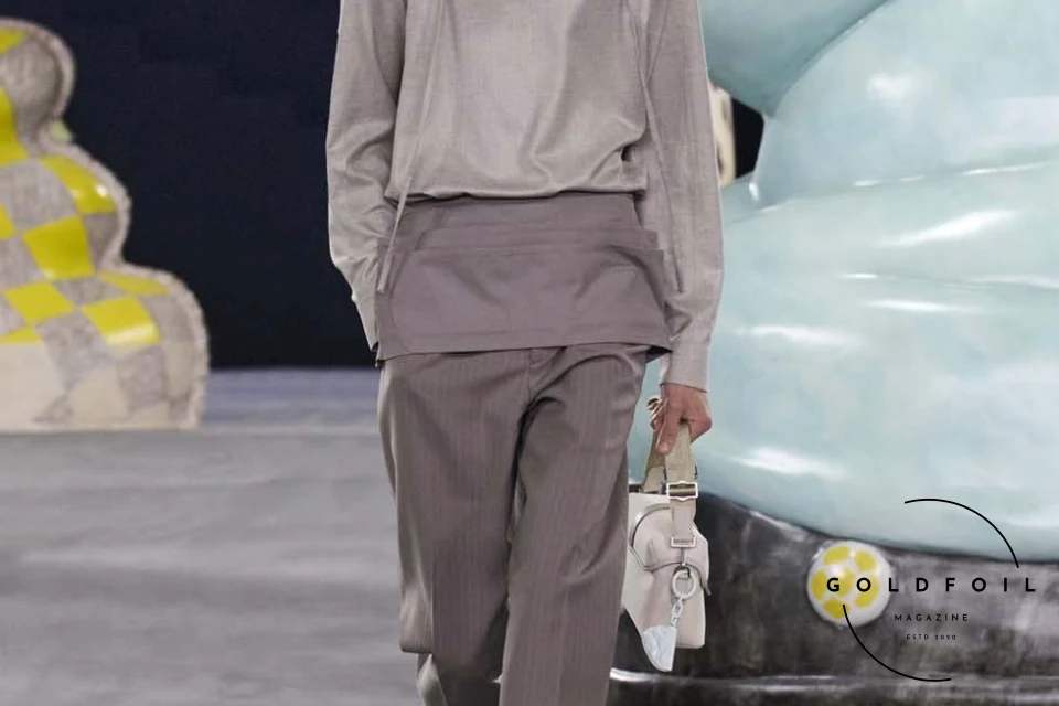 Runway show of Dior Summer 2025 Collection featuring sculptural silhouettes inspired by ceramic forms and atelier craftsmanship, designed by Kim Jones. Runway show of Dior Summer 2025 Collection featuring sculptural silhouettes inspired by ceramic forms and atelier craftsmanship, designed by Kim Jones.