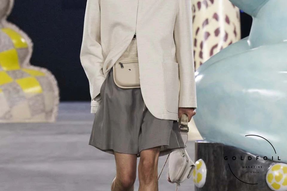 Runway show of Dior Summer 2025 Collection featuring sculptural silhouettes inspired by ceramic forms and atelier craftsmanship, designed by Kim Jones. Runway show of Dior Summer 2025 Collection featuring sculptural silhouettes inspired by ceramic forms and atelier craftsmanship, designed by Kim Jones.