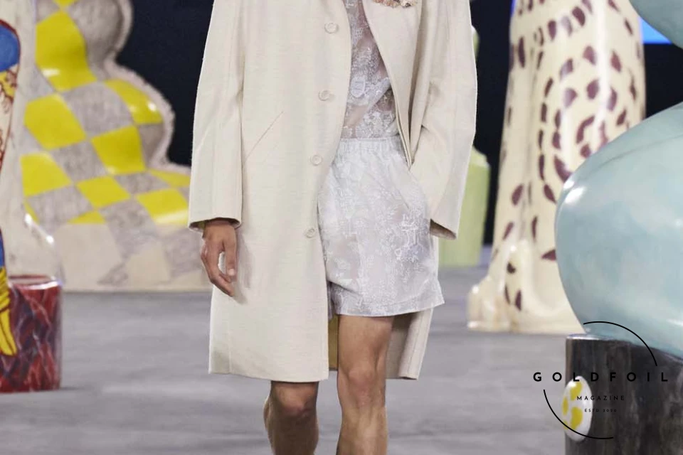 Runway show of Dior Summer 2025 Collection featuring sculptural silhouettes inspired by ceramic forms and atelier craftsmanship, designed by Kim Jones. Runway show of Dior Summer 2025 Collection featuring sculptural silhouettes inspired by ceramic forms and atelier craftsmanship, designed by Kim Jones.