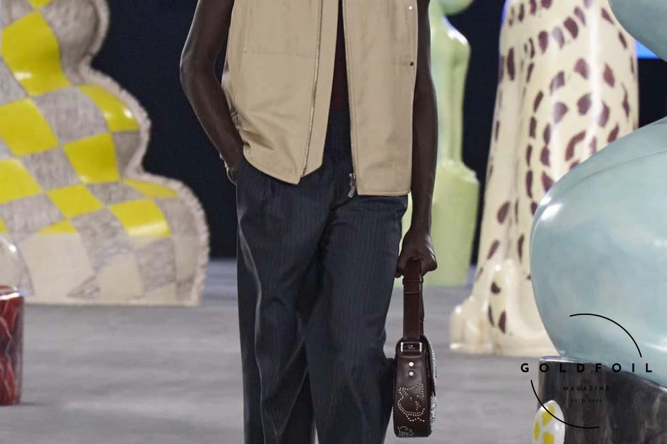 Runway show of Dior Summer 2025 Collection featuring sculptural silhouettes inspired by ceramic forms and atelier craftsmanship, designed by Kim Jones. Runway show of Dior Summer 2025 Collection featuring sculptural silhouettes inspired by ceramic forms and atelier craftsmanship, designed by Kim Jones.