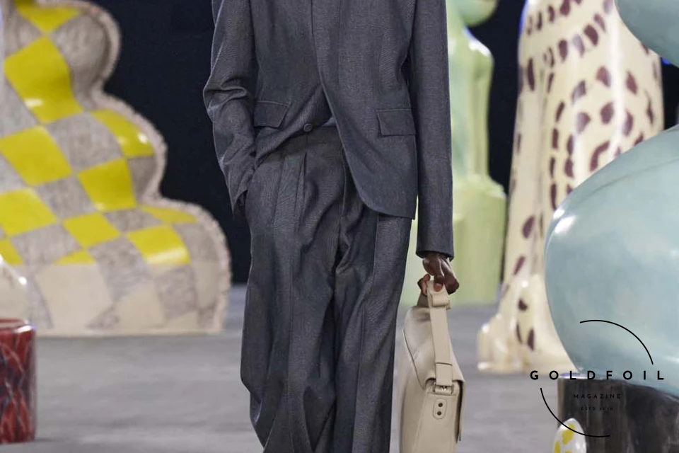 Runway show of Dior Summer 2025 Collection featuring sculptural silhouettes inspired by ceramic forms and atelier craftsmanship, designed by Kim Jones. Runway show of Dior Summer 2025 Collection featuring sculptural silhouettes inspired by ceramic forms and atelier craftsmanship, designed by Kim Jones.