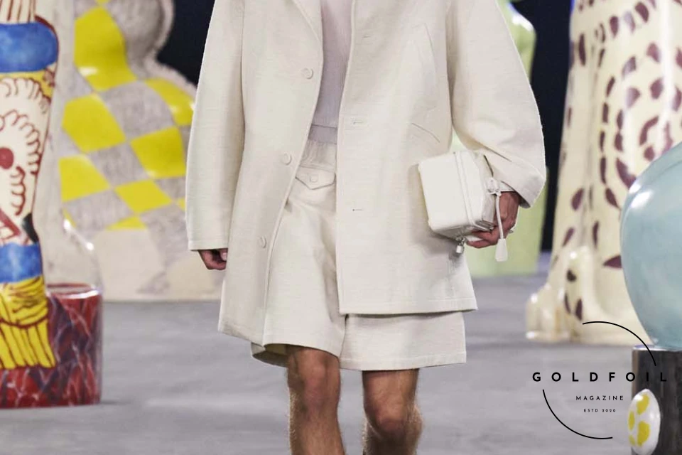 Runway show of Dior Summer 2025 Collection featuring sculptural silhouettes inspired by ceramic forms and atelier craftsmanship, designed by Kim Jones. Runway show of Dior Summer 2025 Collection featuring sculptural silhouettes inspired by ceramic forms and atelier craftsmanship, designed by Kim Jones.