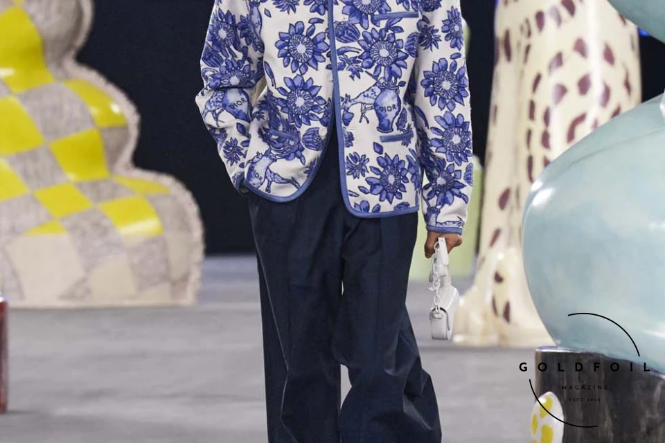 Runway show of Dior Summer 2025 Collection featuring sculptural silhouettes inspired by ceramic forms and atelier craftsmanship, designed by Kim Jones. Runway show of Dior Summer 2025 Collection featuring sculptural silhouettes inspired by ceramic forms and atelier craftsmanship, designed by Kim Jones.