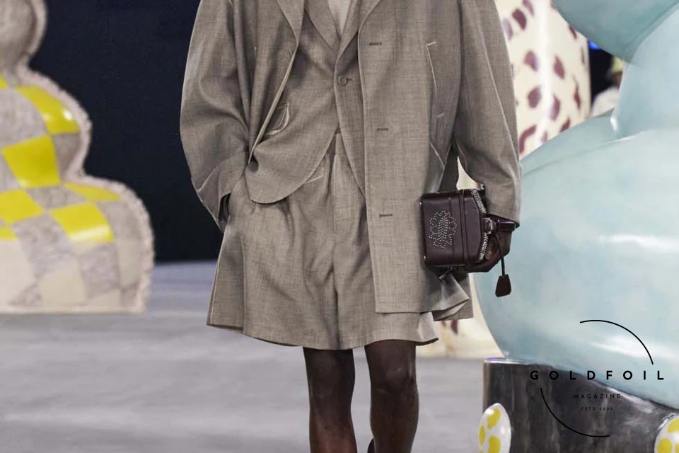 Runway show of Dior Summer 2025 Collection featuring sculptural silhouettes inspired by ceramic forms and atelier craftsmanship, designed by Kim Jones. Runway show of Dior Summer 2025 Collection featuring sculptural silhouettes inspired by ceramic forms and atelier craftsmanship, designed by Kim Jones.