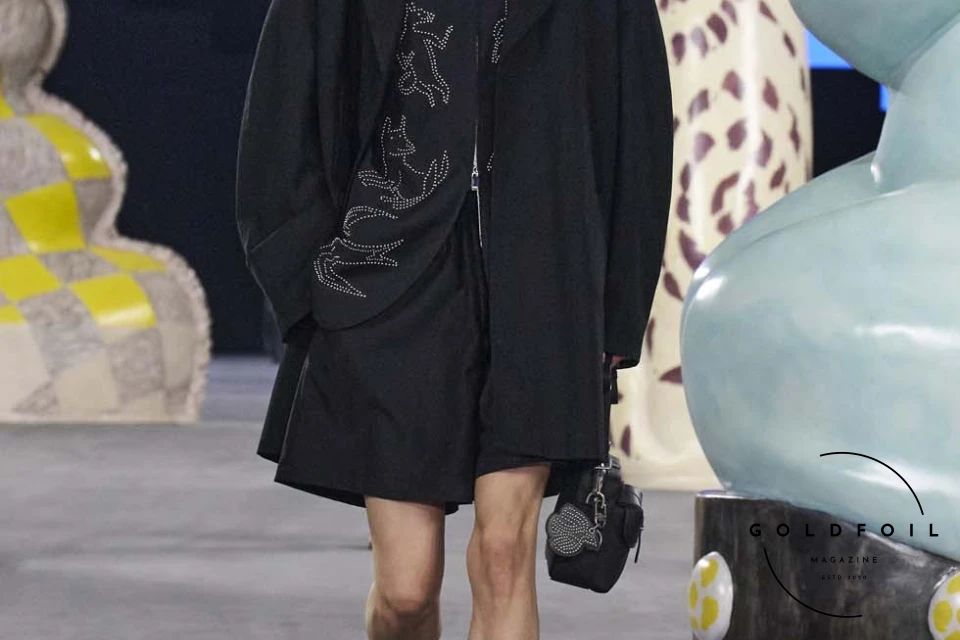 Runway show of Dior Summer 2025 Collection featuring sculptural silhouettes inspired by ceramic forms and atelier craftsmanship, designed by Kim Jones. Runway show of Dior Summer 2025 Collection featuring sculptural silhouettes inspired by ceramic forms and atelier craftsmanship, designed by Kim Jones.