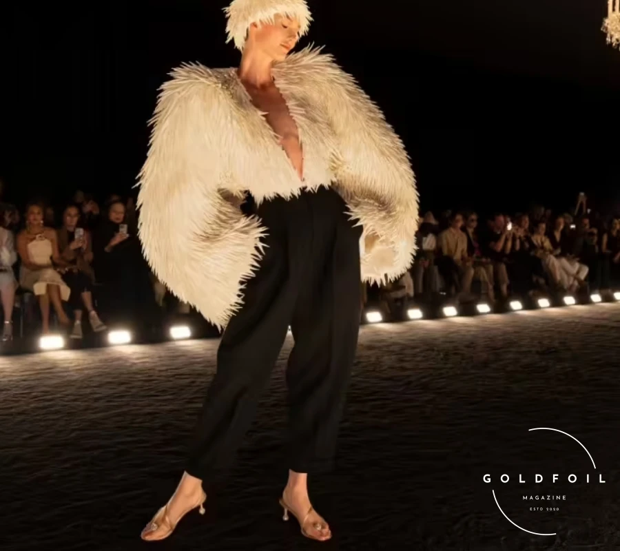 Daniel Roseberry presented what could only be described as one of his best collections since joining Schiaparelli, eschewing gimmicks, props, and influencers like Kylie Jenner with her infamous tiger head from last year. Instead, he focused on craftsmanship through a cinematic quality runway show in a blackout room where fabrics, drapes, and textures spoke through a visual and artistic language. Daniel Roseberry presented what could only be described as one of his best collections since joining Schiaparelli, eschewing gimmicks, props, and influencers like Kylie Jenner with her infamous tiger head from last year. Instead, he focused on craftsmanship through a cinematic quality runway show in a blackout room where fabrics, drapes, and textures spoke through a visual and artistic language.