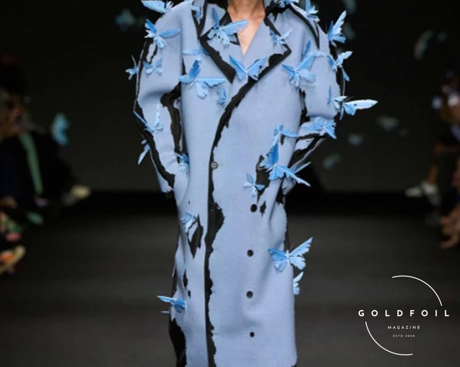 To translate the concept of the passing of time into clothing, Wun envisioned the progression of seasons. The opening look, a majestic black gown with a matching veil embroidered in crystals, depicted “the first falling of snow,” symbolizing winter and its reflective nature. For Wun, accepting time’s limitations fuels creativity; the only way to make time meaningful is to enjoy the moments given, regardless of success or failure. To translate the concept of the passing of time into clothing, Wun envisioned the progression of seasons. The opening look, a majestic black gown with a matching veil embroidered in crystals, depicted “the first falling of snow,” symbolizing winter and its reflective nature. For Wun, accepting time’s limitations fuels creativity; the only way to make time meaningful is to enjoy the moments given, regardless of success or failure.