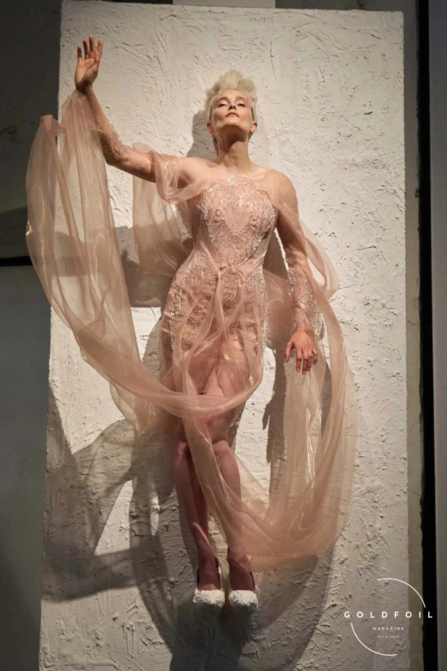 This collection also marked Van Herpen's venture into purely artistic practice, with four additional works that combined solid oil paint, airy tulle, and hand-pleated silk. Reflecting on her recent retrospective at the Musée des Arts Décoratifs, which drew a record-breaking crowd, Van Herpen explained,  This collection also marked Van Herpen's venture into purely artistic practice, with four additional works that combined solid oil paint, airy tulle, and hand-pleated silk. Reflecting on her recent retrospective at the Musée des Arts Décoratifs, which drew a record-breaking crowd, Van Herpen explained,