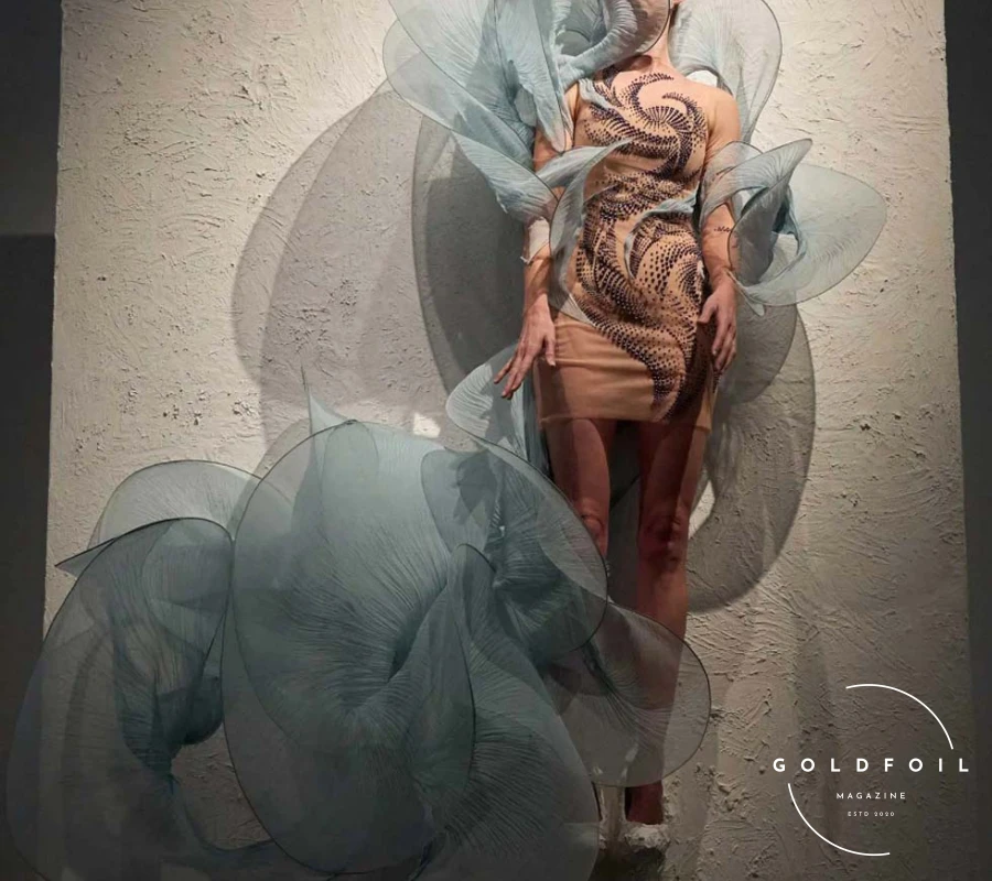 This collection also marked Van Herpen's venture into purely artistic practice, with four additional works that combined solid oil paint, airy tulle, and hand-pleated silk. Reflecting on her recent retrospective at the Musée des Arts Décoratifs, which drew a record-breaking crowd, Van Herpen explained,  This collection also marked Van Herpen's venture into purely artistic practice, with four additional works that combined solid oil paint, airy tulle, and hand-pleated silk. Reflecting on her recent retrospective at the Musée des Arts Décoratifs, which drew a record-breaking crowd, Van Herpen explained,