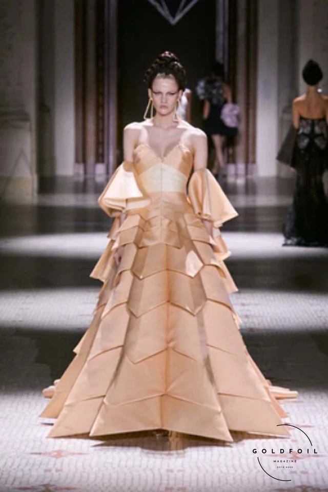 Nature’s reflection of math was apparent in her designs, with patterns resembling blooms and fresh pink florals adorning cocktail dresses and ballgowns. Retro-futuristic dresses floated away from the body, evoking early Pierre Cardin, while 3D-printed embroidery patterns and GOTS-certified organic textiles underscored her commitment to sustainability. Ardakani's creations, viewed as wearable art, were displayed at the Musée des Arts et Décoratifs, marking a significant moment for her five-year-old house and hinting at future innovations for her ready-to-wear line. Nature’s reflection of math was apparent in her designs, with patterns resembling blooms and fresh pink florals adorning cocktail dresses and ballgowns. Retro-futuristic dresses floated away from the body, evoking early Pierre Cardin, while 3D-printed embroidery patterns and GOTS-certified organic textiles underscored her commitment to sustainability. Ardakani's creations, viewed as wearable art, were displayed at the Musée des Arts et Décoratifs, marking a significant moment for her five-year-old house and hinting at future innovations for her ready-to-wear line.