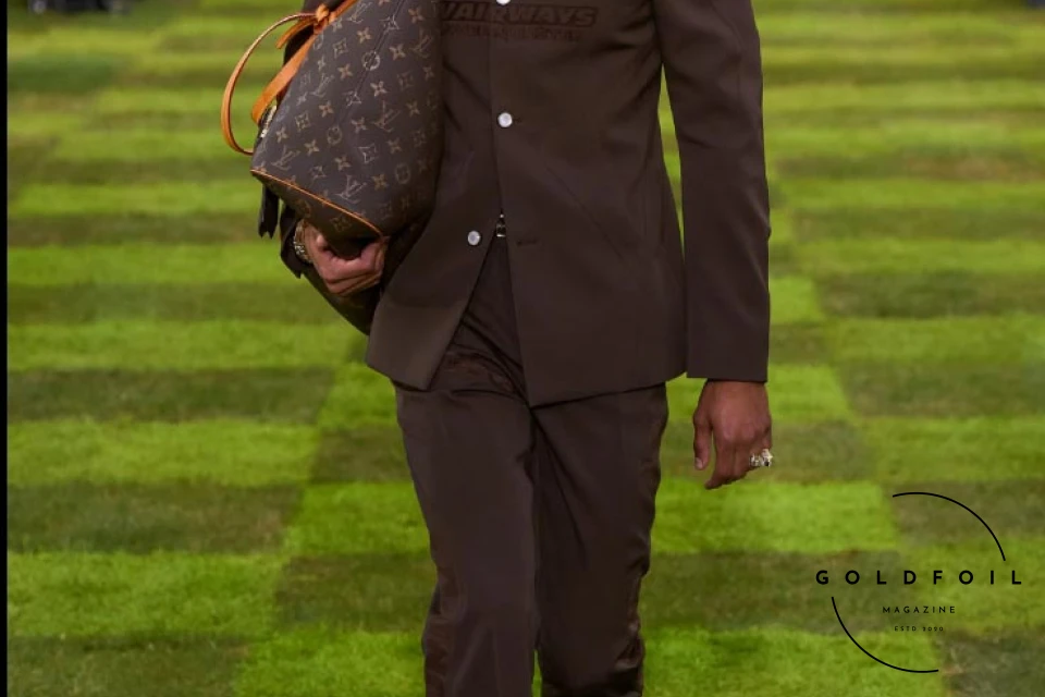The Louis Vuitton Spring/Summer 2025 is one for the history books. While many were wondering whether the creativity in the brand had reached its peak, we just discovered that there is more and Pharrell is only just getting started. One could argue this, is perhaps one of the designer’s strongest collections we have seen thus far, and how else? The message is endearing and important - it is a message of unity, calling the consumer a citizen of the planet without boundaries. This pulls the focus away from the hype fashion we have been seeing since 2016 and goes to the more classic approach of traditional tailoring and timeless silhouettes but reimagined - new prints, materials, and don’t even get us started on the ACCESSORIES this season! The runway comes packed with new ideas and a lesson or two on styling. The Louis Vuitton Spring/Summer 2025 is one for the history books. While many were wondering whether the creativity in the brand had reached its peak, we just discovered that there is more and Pharrell is only just getting started. One could argue this, is perhaps one of the designer’s strongest collections we have seen thus far, and how else? The message is endearing and important - it is a message of unity, calling the consumer a citizen of the planet without boundaries. This pulls the focus away from the hype fashion we have been seeing since 2016 and goes to the more classic approach of traditional tailoring and timeless silhouettes but reimagined - new prints, materials, and don’t even get us started on the ACCESSORIES this season! The runway comes packed with new ideas and a lesson or two on styling.