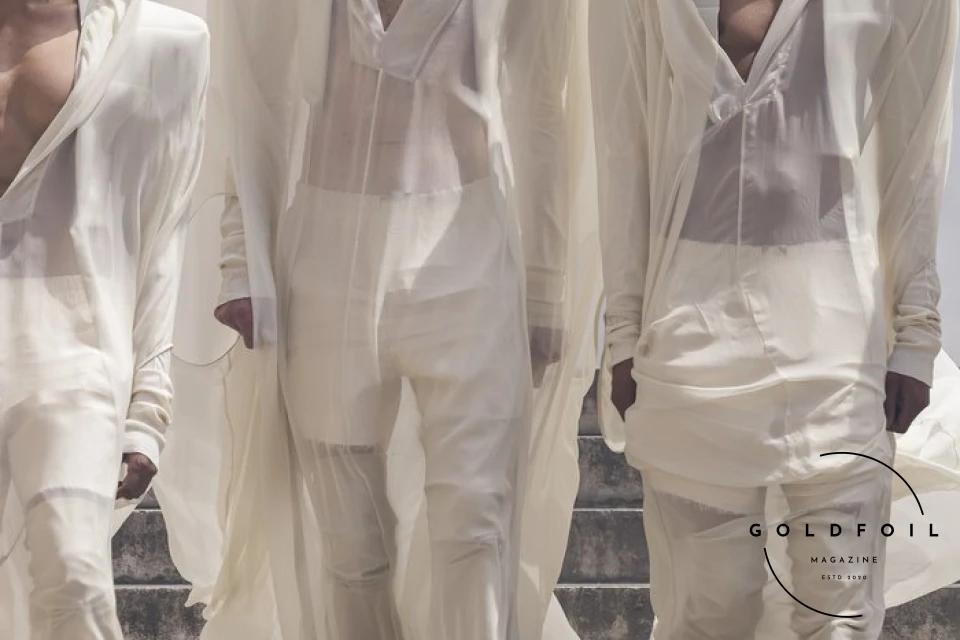 The culmination of Rick Owens’s show was this human tower, with a female model holding a white flag depicting two arms holding hands - one black and one white. What’s interesting about the show is that Rick opened the doors to students and people who would generally not have direct access into the show, and asked them to be a part of this political performance. The culmination of Rick Owens’s show was this human tower, with a female model holding a white flag depicting two arms holding hands - one black and one white. What’s interesting about the show is that Rick opened the doors to students and people who would generally not have direct access into the show, and asked them to be a part of this political performance.