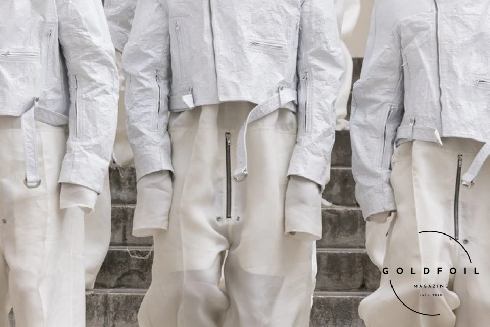 The culmination of Rick Owens’s show was this human tower, with a female model holding a white flag depicting two arms holding hands - one black and one white. What’s interesting about the show is that Rick opened the doors to students and people who would generally not have direct access into the show, and asked them to be a part of this political performance. The culmination of Rick Owens’s show was this human tower, with a female model holding a white flag depicting two arms holding hands - one black and one white. What’s interesting about the show is that Rick opened the doors to students and people who would generally not have direct access into the show, and asked them to be a part of this political performance.