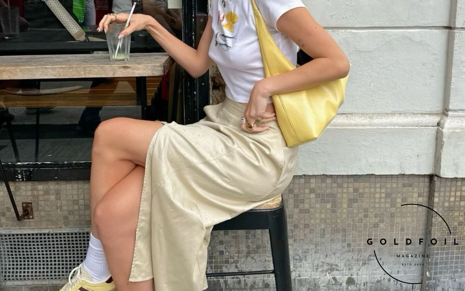 An Instagram influencer wears a pair of adidas gazelle sneakers in white and red stripes, paired with matching white socks with hearts and a white and red hearts shirt, with a red jumper over the back, wide jeans and a red bag An Instagram influencer wears a pair of adidas gazelle sneakers in white and red stripes, paired with matching white socks with hearts and a white and red hearts shirt, with a red jumper over the back, wide jeans and a red bag