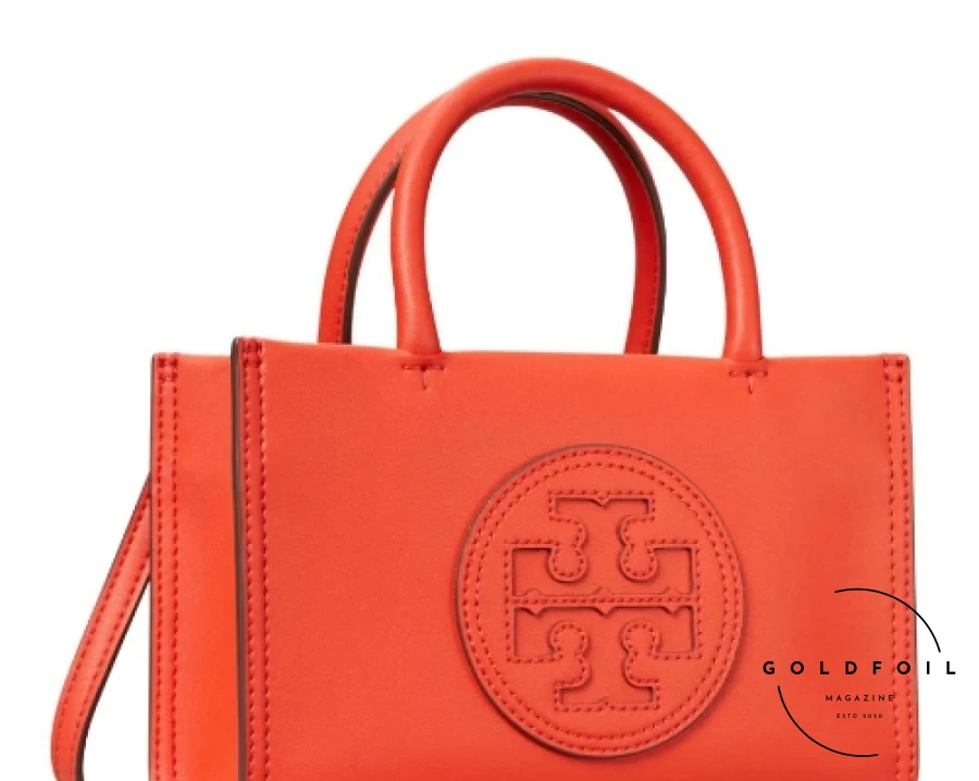 the tory burch red tote bag is the ultimate summer accesory complimenting your adidas gazelle trainers and straight leg jeans from dr denim on asos the tory burch red tote bag is the ultimate summer accesory complimenting your adidas gazelle trainers and straight leg jeans from dr denim on asos