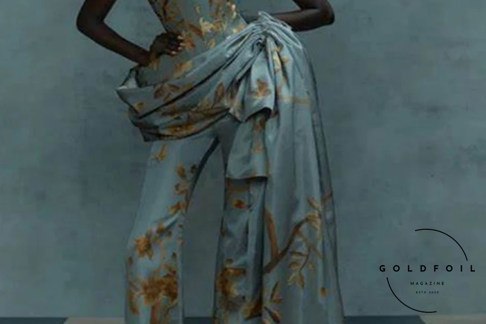 Harris Reed designed a stunning couture jumpsuit with a beautiful corset in ash blue Harris Reed designed a stunning couture jumpsuit with a beautiful corset in ash blue