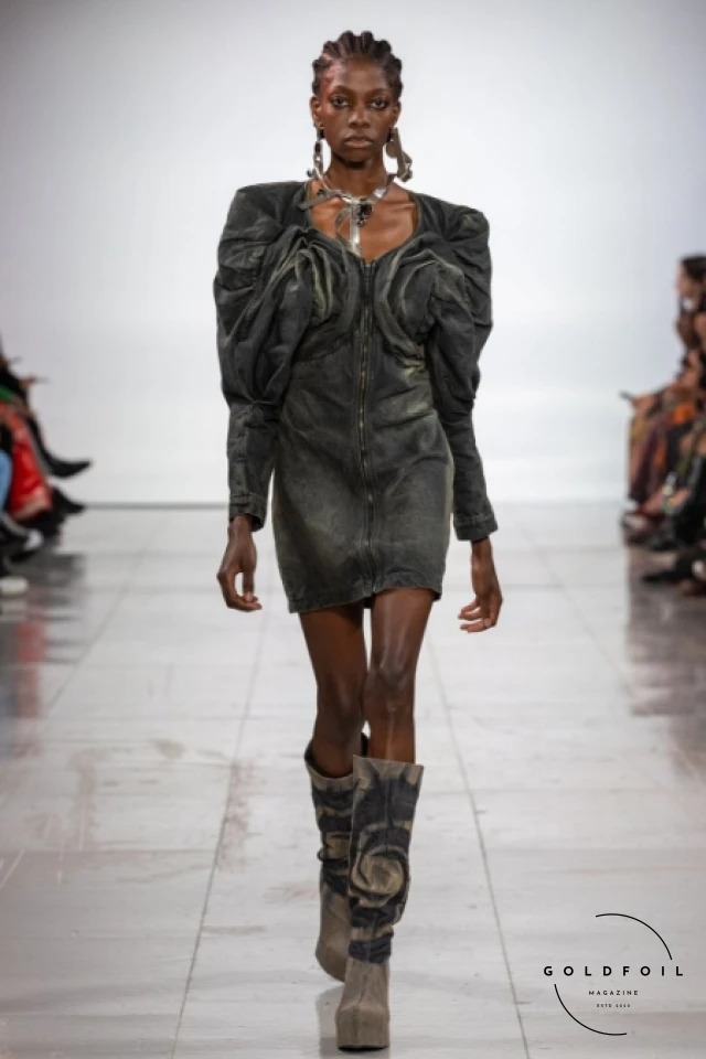 MASHA POPOVA is a Ukrainian designer known for her deconstructed and experimental approach to fashion. Her collections often feature bold silhouettes, intricate detailing, and a fusion of traditional and modern elements. MASHA POPOVA is a Ukrainian designer known for her deconstructed and experimental approach to fashion. Her collections often feature bold silhouettes, intricate detailing, and a fusion of traditional and modern elements.