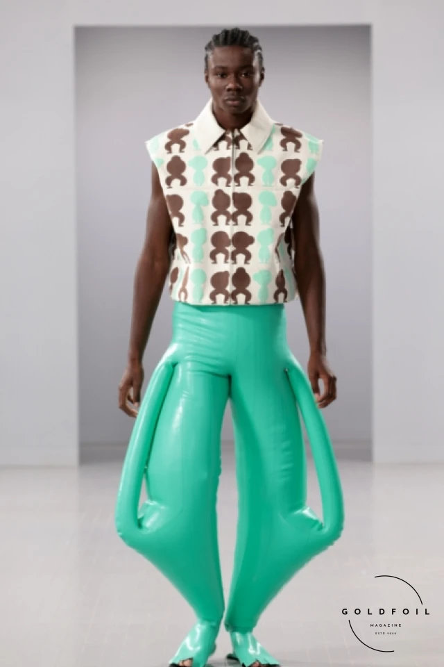 HARRI, founded by Harikrishnan Keezhathil Surendran Pillai, is known for its avant-garde and futuristic designs that challenge traditional menswear conventions. The brand often features exaggerated silhouettes, innovative materials, and a playful aesthetic. HARRI, founded by Harikrishnan Keezhathil Surendran Pillai, is known for its avant-garde and futuristic designs that challenge traditional menswear conventions. The brand often features exaggerated silhouettes, innovative materials, and a playful aesthetic.