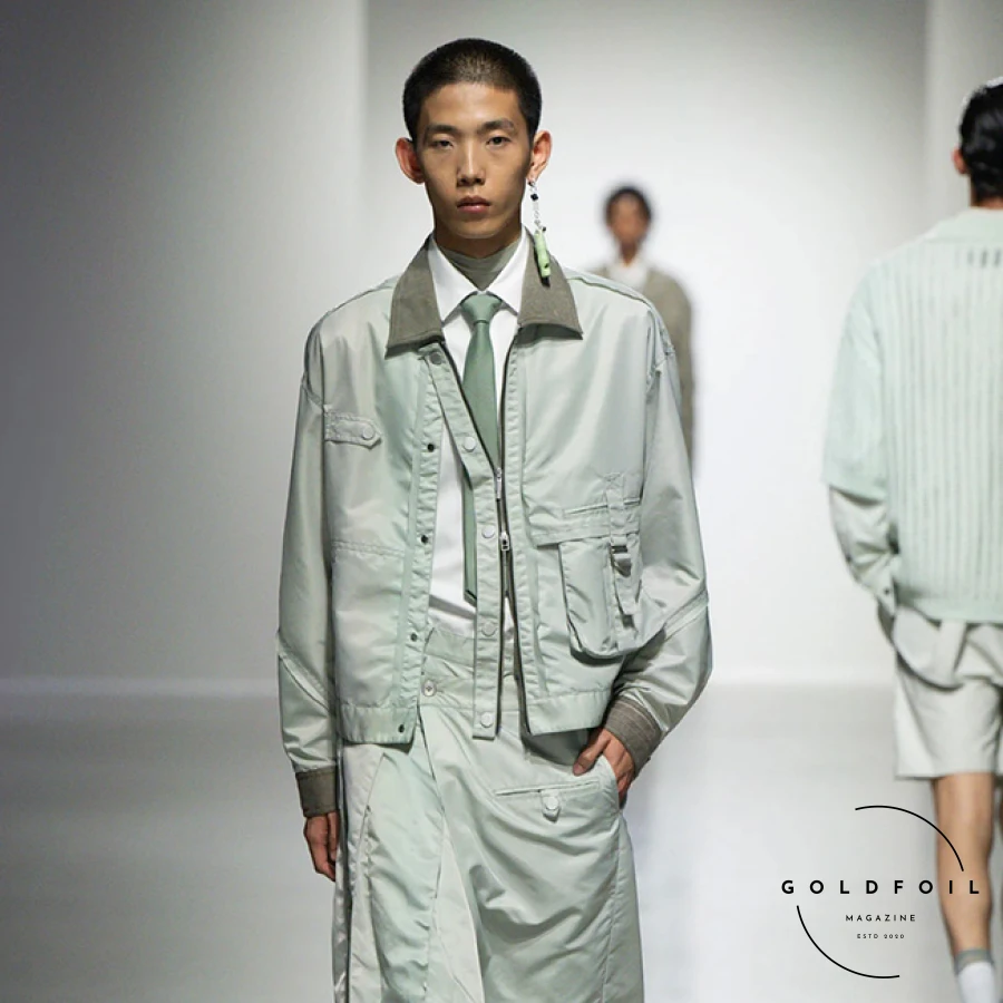 The designer transformed the underground halls of Palais de Tokyo with a futuristic and deconstructed showcase of 35 menswear looks, including standout pieces like colossal shoe covers and a unique UGG collaboration. From office-ready attire to sleek eveningwear, her collection showcased her signature deconstructed techniques and bold vision, solidifying her reputation as a leading designer. The show was inspired by old artefacts and the passing of time, and the colour palette reflected this really well, starting off with a colder blue-tinted white, before transitioning into stained ochra, and darker brown, before closing off with a few denim and black pieces. The designer transformed the underground halls of Palais de Tokyo with a futuristic and deconstructed showcase of 35 menswear looks, including standout pieces like colossal shoe covers and a unique UGG collaboration. From office-ready attire to sleek eveningwear, her collection showcased her signature deconstructed techniques and bold vision, solidifying her reputation as a leading designer. The show was inspired by old artefacts and the passing of time, and the colour palette reflected this really well, starting off with a colder blue-tinted white, before transitioning into stained ochra, and darker brown, before closing off with a few denim and black pieces.