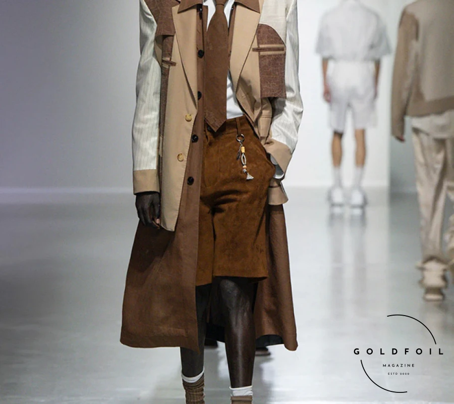 The designer transformed the underground halls of Palais de Tokyo with a futuristic and deconstructed showcase of 35 menswear looks, including standout pieces like colossal shoe covers and a unique UGG collaboration. From office-ready attire to sleek eveningwear, her collection showcased her signature deconstructed techniques and bold vision, solidifying her reputation as a leading designer. The show was inspired by old artefacts and the passing of time, and the colour palette reflected this really well, starting off with a colder blue-tinted white, before transitioning into stained ochra, and darker brown, before closing off with a few denim and black pieces. The designer transformed the underground halls of Palais de Tokyo with a futuristic and deconstructed showcase of 35 menswear looks, including standout pieces like colossal shoe covers and a unique UGG collaboration. From office-ready attire to sleek eveningwear, her collection showcased her signature deconstructed techniques and bold vision, solidifying her reputation as a leading designer. The show was inspired by old artefacts and the passing of time, and the colour palette reflected this really well, starting off with a colder blue-tinted white, before transitioning into stained ochra, and darker brown, before closing off with a few denim and black pieces.