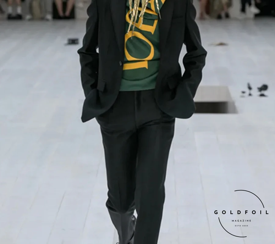 Jonathan Anderson's Loewe Spring men's show exuded restraint and minimalism, set in a serene space with metal mouse sculptures and Susan Sontag's  Jonathan Anderson's Loewe Spring men's show exuded restraint and minimalism, set in a serene space with metal mouse sculptures and Susan Sontag's