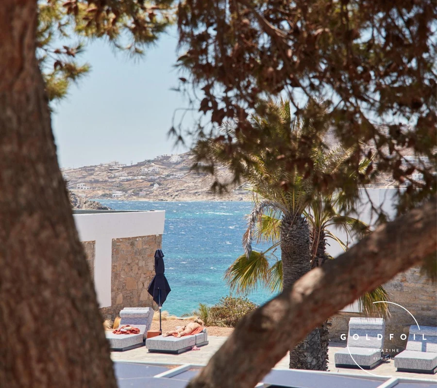 A historic landmark, Mykonos Theoxenia combines 1960s glamour with modern luxury. The hotel’s stylish design, beautiful gardens, and prime location near Mykonos Town make it a standout choice. Guests can enjoy elegant rooms, a tranquil pool area, and exceptional dining options. The on-site restaurant serves Mediterranean cuisine, and the hotel’s proximity to the town’s vibrant nightlife makes it a perfect base for exploring the island. A historic landmark, Mykonos Theoxenia combines 1960s glamour with modern luxury. The hotel’s stylish design, beautiful gardens, and prime location near Mykonos Town make it a standout choice. Guests can enjoy elegant rooms, a tranquil pool area, and exceptional dining options. The on-site restaurant serves Mediterranean cuisine, and the hotel’s proximity to the town’s vibrant nightlife makes it a perfect base for exploring the island.