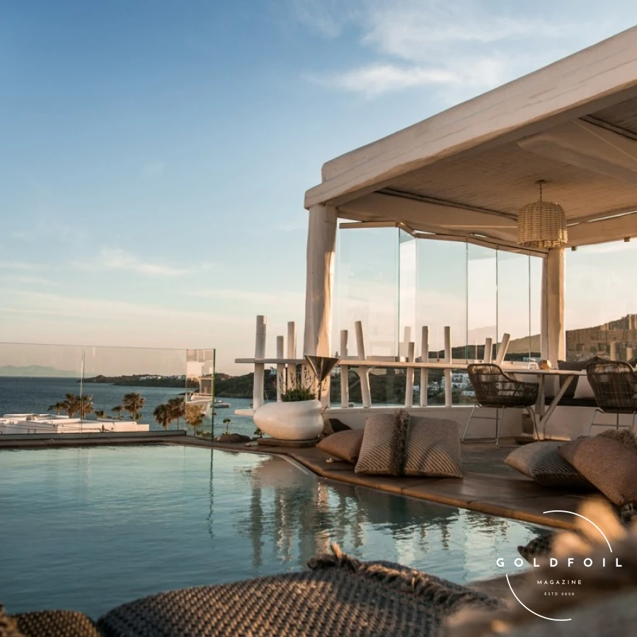 Kensho Ornos combines traditional Mykonian architecture with modern luxury. The stylish rooms and suites, exceptional dining, and state-of-the-art spa create a luxurious and relaxing atmosphere. The hotel’s location in Ornos provides easy access to beautiful beaches and Mykonos Town. Guests can also enjoy a range of water sports and activities, making it a perfect destination for both relaxation and adventure. Kensho Ornos combines traditional Mykonian architecture with modern luxury. The stylish rooms and suites, exceptional dining, and state-of-the-art spa create a luxurious and relaxing atmosphere. The hotel’s location in Ornos provides easy access to beautiful beaches and Mykonos Town. Guests can also enjoy a range of water sports and activities, making it a perfect destination for both relaxation and adventure.