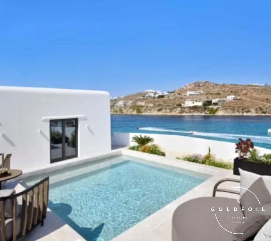 Located near Mykonos Town, Aeonic Suites and Spa is a modern oasis of tranquillity. The suites are designed with a sleek, minimalist aesthetic, and the infinity pool offers stunning sunset views. The spa provides a range of rejuvenating treatments, making it a perfect retreat after exploring the island’s vibrant nightlife. Guests can also enjoy gourmet dining at Cove Restaurant, which serves Mediterranean dishes with a contemporary twist. Located near Mykonos Town, Aeonic Suites and Spa is a modern oasis of tranquillity. The suites are designed with a sleek, minimalist aesthetic, and the infinity pool offers stunning sunset views. The spa provides a range of rejuvenating treatments, making it a perfect retreat after exploring the island’s vibrant nightlife. Guests can also enjoy gourmet dining at Cove Restaurant, which serves Mediterranean dishes with a contemporary twist.