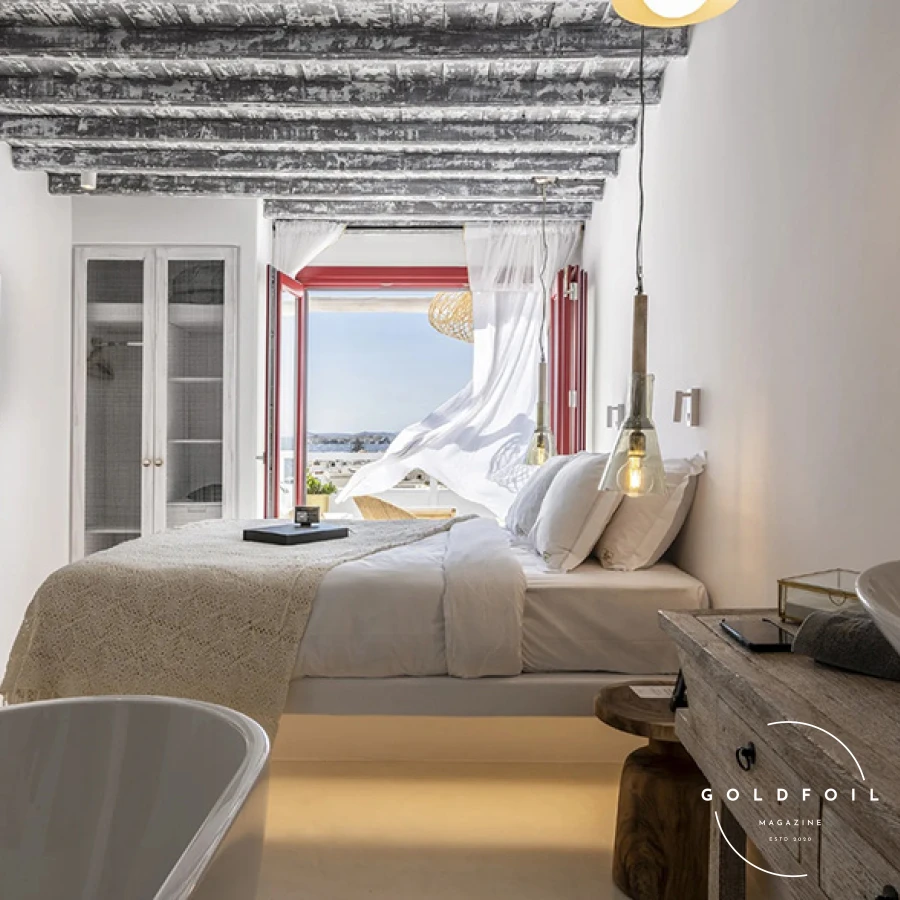 Located in the heart of Mykonos Town, The TownHouse offers a chic and contemporary retreat. The stylish rooms and suites, rooftop bar with panoramic views, and prime location make it a perfect base for exploring the island’s vibrant nightlife and cultural attractions. Guests can also enjoy a range of amenities, including a fitness centre and a spa. Located in the heart of Mykonos Town, The TownHouse offers a chic and contemporary retreat. The stylish rooms and suites, rooftop bar with panoramic views, and prime location make it a perfect base for exploring the island’s vibrant nightlife and cultural attractions. Guests can also enjoy a range of amenities, including a fitness centre and a spa.