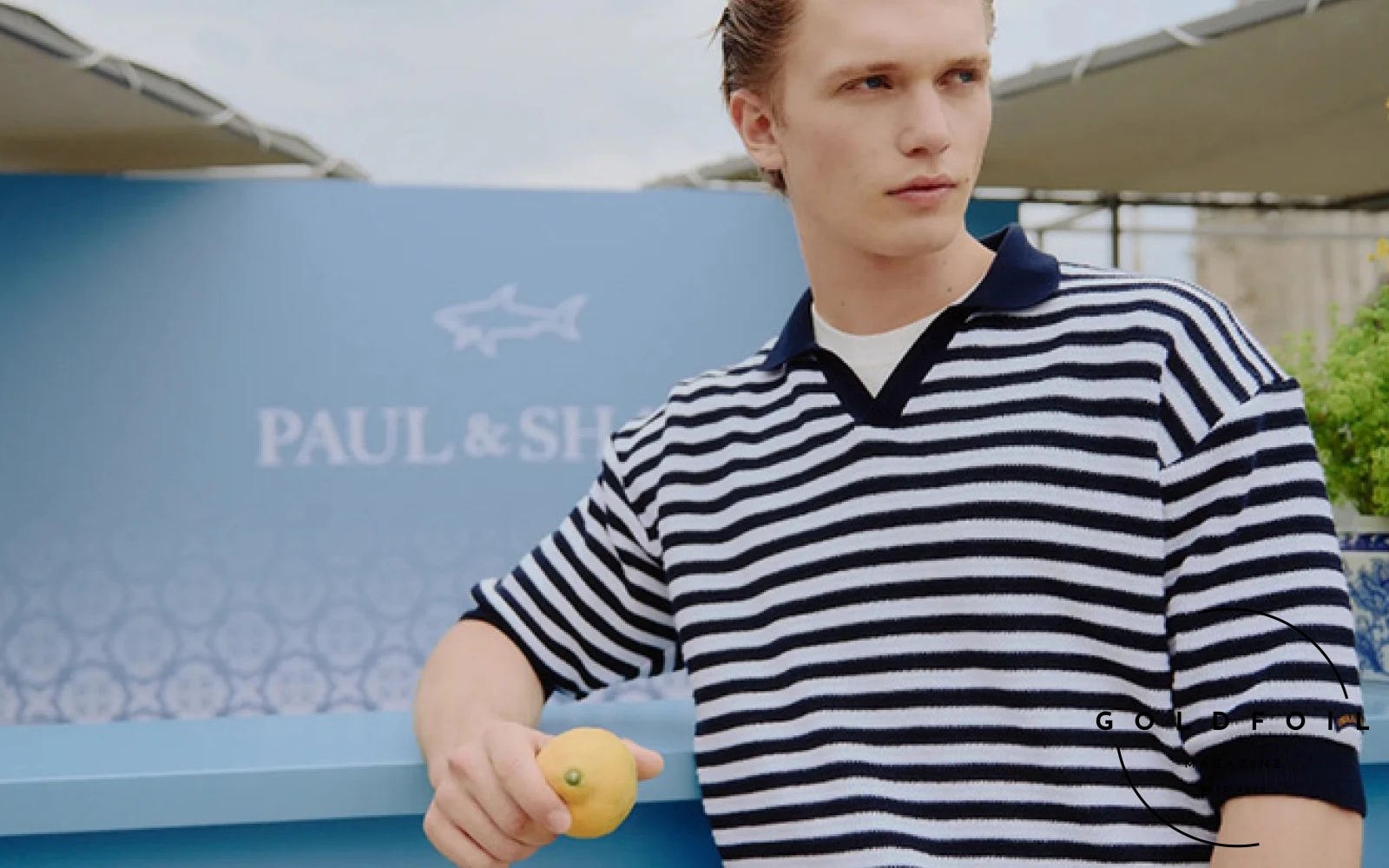 Paul & Shark's SS25 Riviera Capri collection dazzled Milan Fashion Week by capturing the essence of Capri's chic charm. Transforming the Terrazza Duomo into a Capri-inspired oasis, the collection featured ultra-light swim shorts, silk polos, and colorful linen shirts, highlighted by a Liberty of London print showcasing Capri’s iconic landscapes. The collection seamlessly merges luxury with the relaxed vibe of the Mediterranean, reflecting Paul & Shark's commitment to sustainability and style. The brand’s Milan debut, marked by an elegant rooftop setting and Neapolitan folk music, brought a taste of Capri’s sun-soaked allure to the fashion capital. Paul & Shark's SS25 Riviera Capri collection dazzled Milan Fashion Week by capturing the essence of Capri's chic charm. Transforming the Terrazza Duomo into a Capri-inspired oasis, the collection featured ultra-light swim shorts, silk polos, and colorful linen shirts, highlighted by a Liberty of London print showcasing Capri’s iconic landscapes. The collection seamlessly merges luxury with the relaxed vibe of the Mediterranean, reflecting Paul & Shark's commitment to sustainability and style. The brand’s Milan debut, marked by an elegant rooftop setting and Neapolitan folk music, brought a taste of Capri’s sun-soaked allure to the fashion capital.