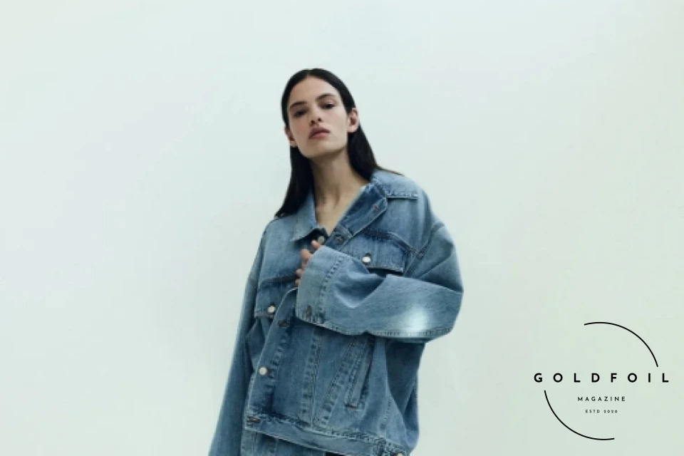 A model wears a double denim look featuring an oversized denim jacket, with high waisted straight leg jeans and black leather boots, the best denim brands for winter 2024 the best affordable denim jeans A model wears a double denim look featuring an oversized denim jacket, with high waisted straight leg jeans and black leather boots, the best denim brands for winter 2024 the best affordable denim jeans